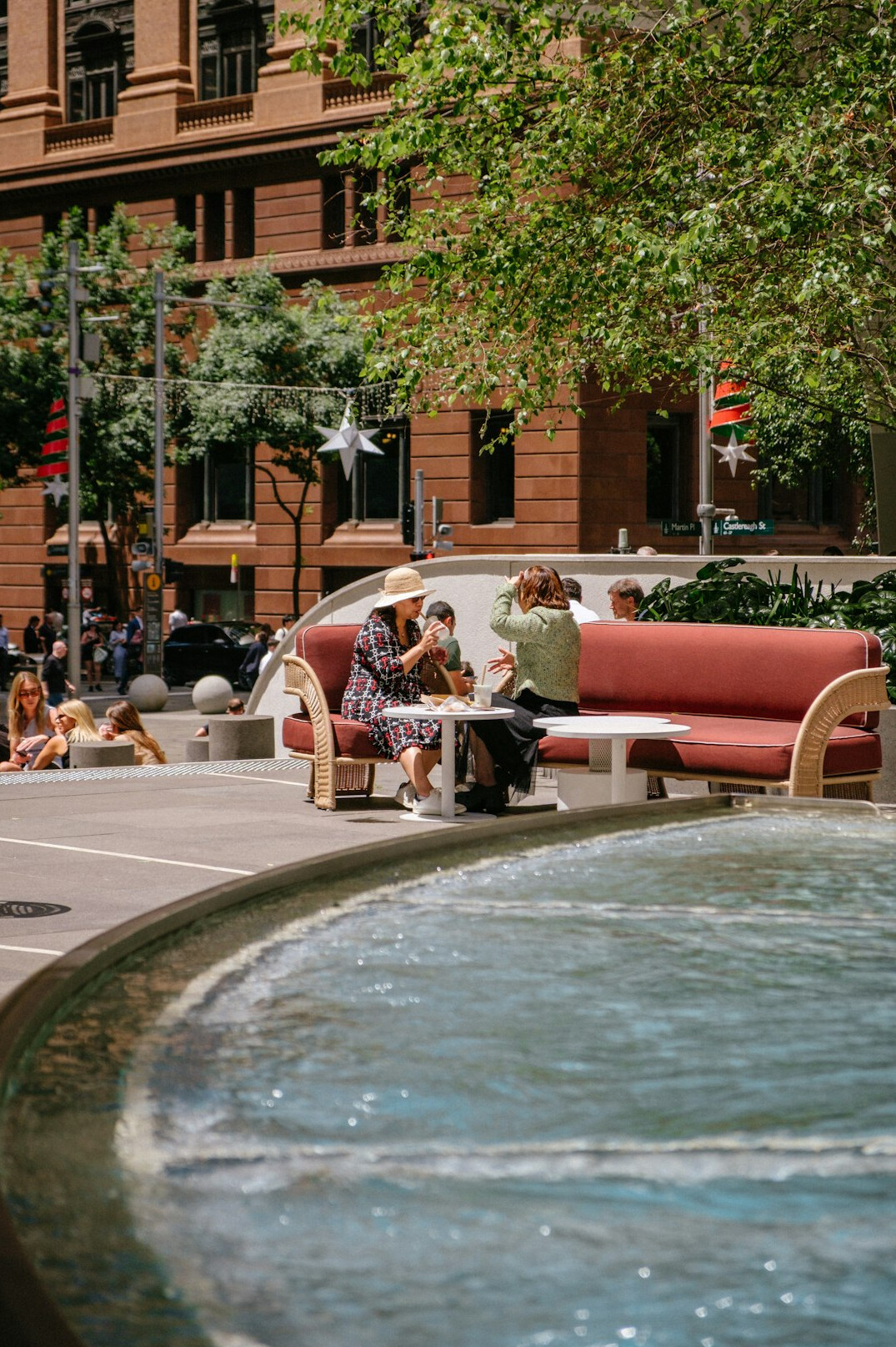 Neighbors gathered and chatting in a public plaza